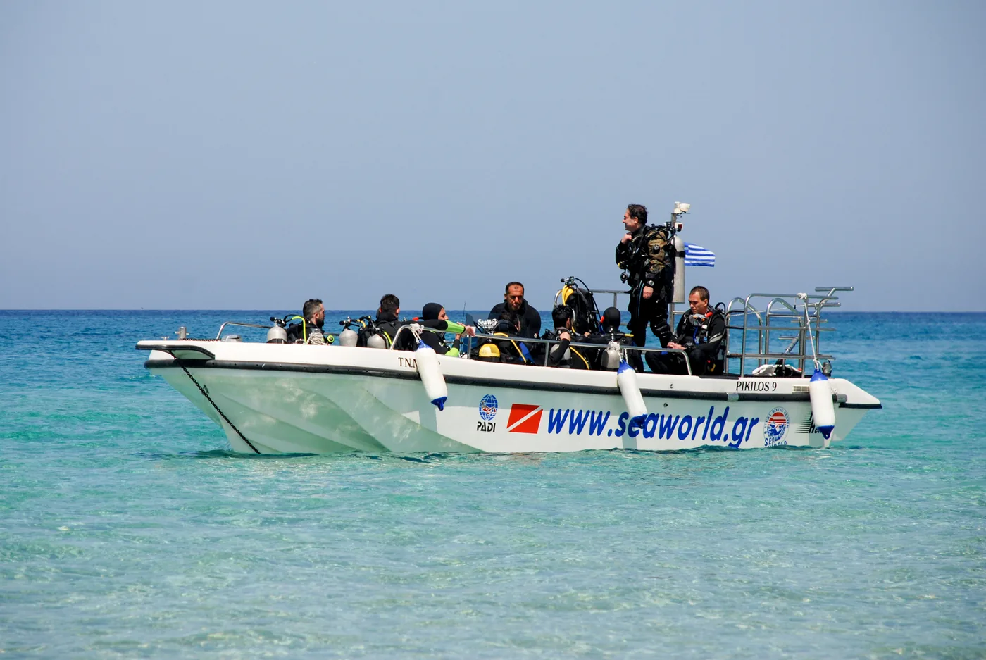 The SeaWorld diving team aboard the training boat