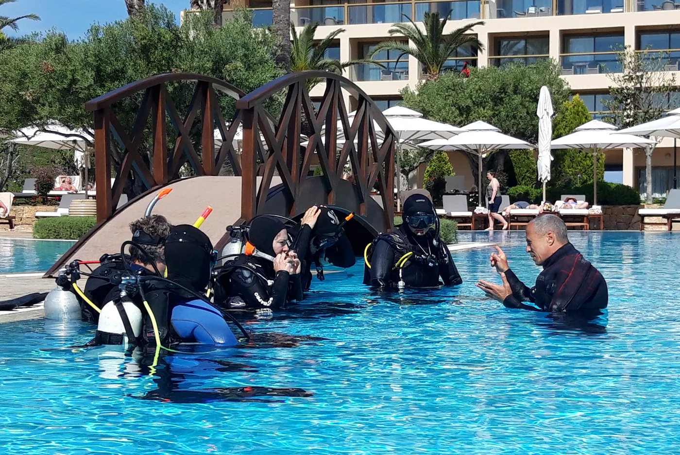 Instructor development session in the resort pool