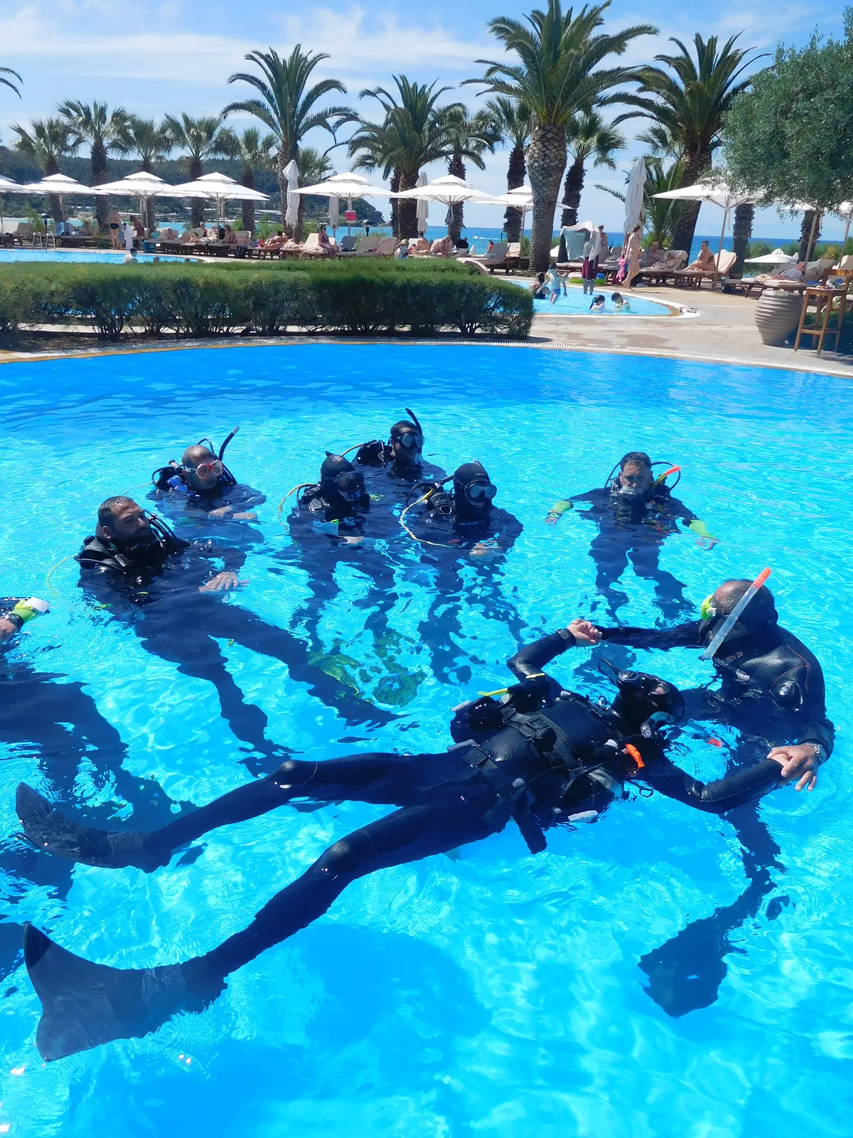 Rescue skills training with a group of divers in the pool