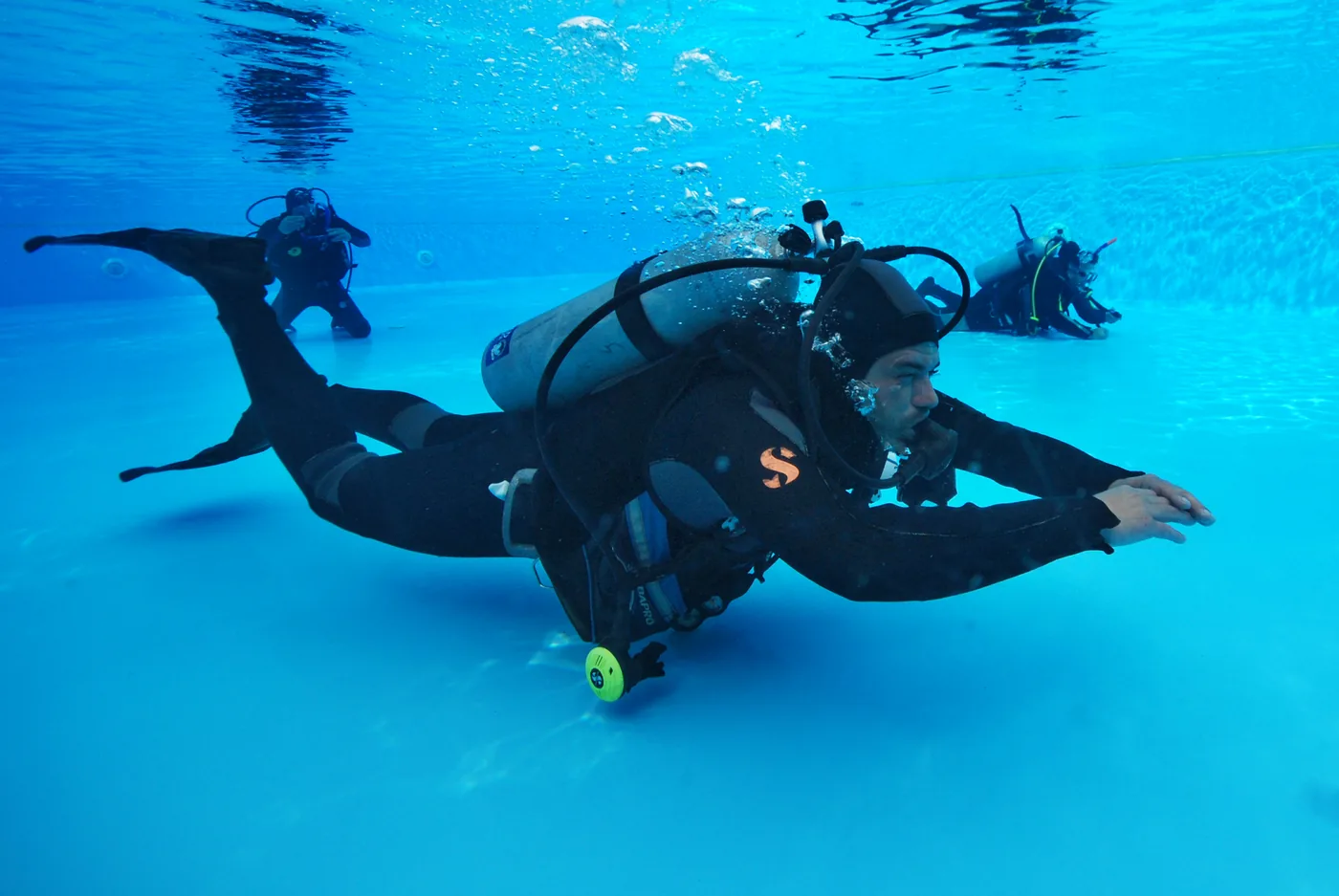 A diver practising buoyancy during IDC pool training