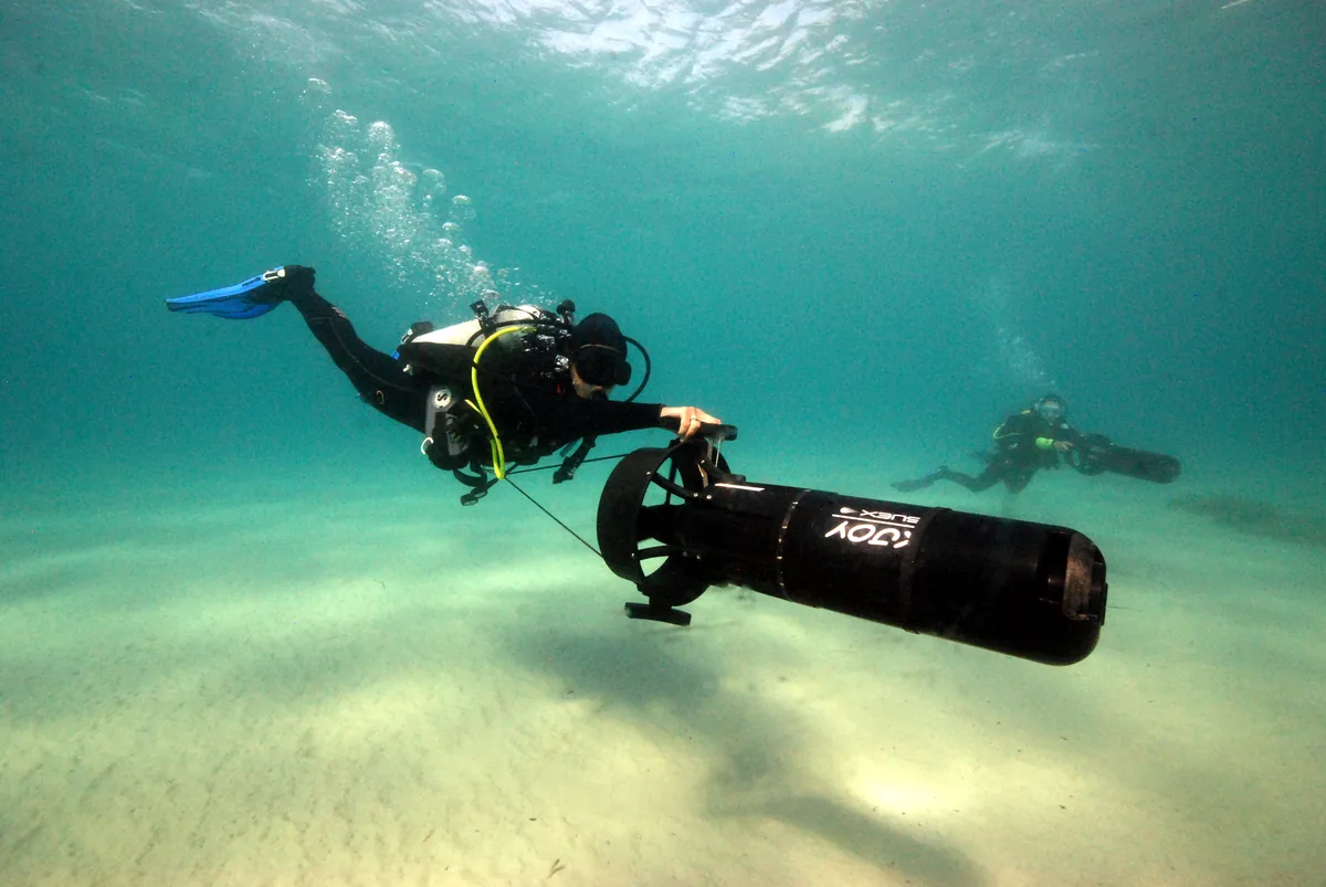 A diver using an underwater scooter