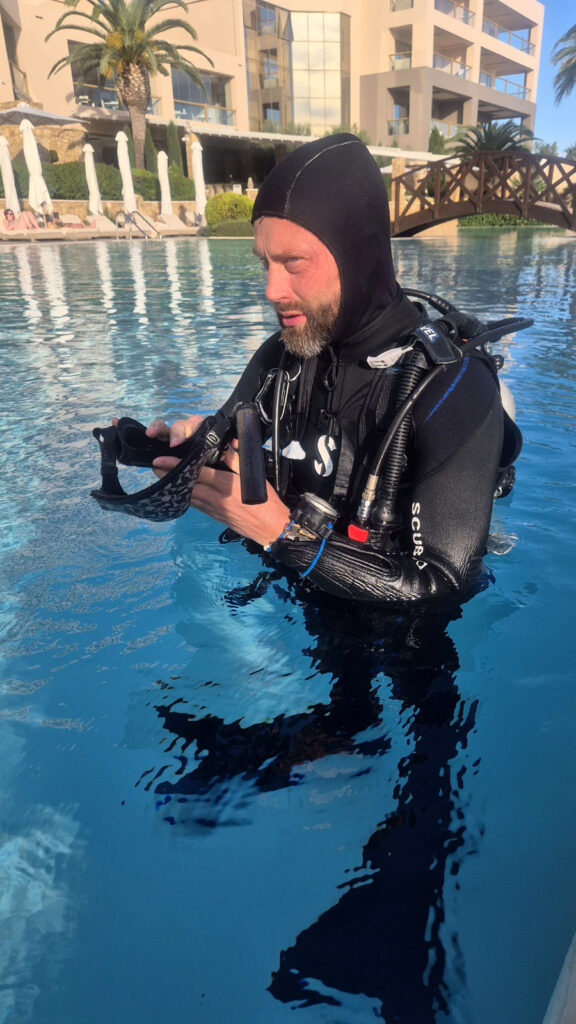 PADI professional getting ready for training session