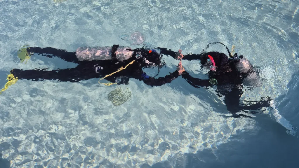 Student and instructor underwater